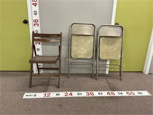 3 folding chairs. 1 wood 2 metal