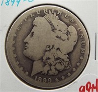 1899-O Morgan silver dollar.