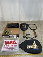 Racquetball rackets and swim goggles