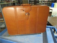vintage tan suitcase with wheels