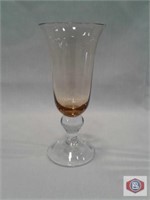 Amber champagne glass. (593)