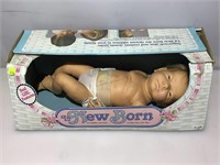 La New Born doll with real girl features. Box is
