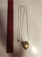 Hollow Heart necklace with incised stars on chain