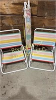 Two beach chairs and umbrella