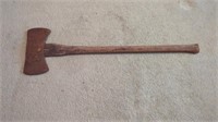 ANTIQUE AX WITH A WOODEN HANDLE