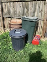 Assorted trash cans and air tank