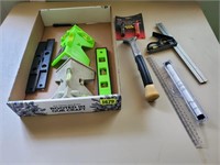 Box of levels, rulers, tools