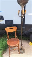 Antique wood chair and floor lamp