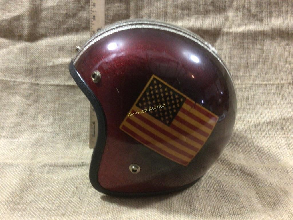Motorcycle helmet featuring American flag