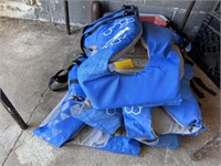 Stack of Blue Life Vests