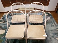 Four (4) metal folding chairs