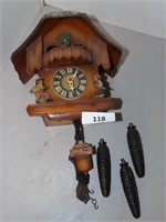 German Coo coo Clock w pine cones weights