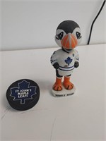 1.   BOBBLE BUDDY the PUFFIN and hockey puck