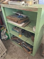 Wood shelf unit painted green
