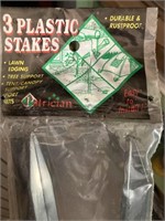 Several packages of plant stakes