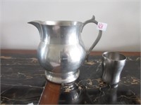 pewter pitcher and cup