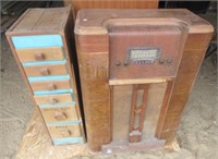 Antique radio and (6) draw wood cabinet.