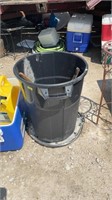 Plastic garbage can, horse hitching halter