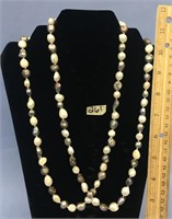Approx. 24" strand of white and black fresh water