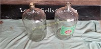 2 5 gallon glass jugs