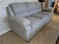 Grey couch new was used for 1 month raymour