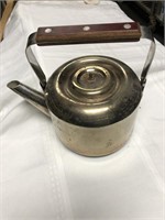 Vintage brass teapot with brown wooden handle