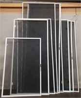 Lot of 9 Assorted Size Window Screens. A Couple