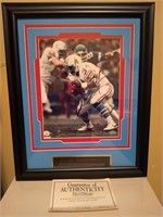 Framed autographed Earl Campbell portrait 17x14