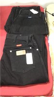 2 pair women’s Wranglers size 13 and 13/14