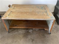 Rustic coffee table on wheels