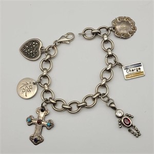 SILVER CHARM BRACELET SEVERAL CHARMS MARKED 925