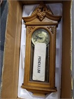 New clock with pendulum in box