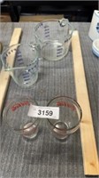 Coca-Cola cups, and measuring cups