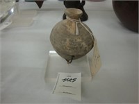 Roman terracotta bottle with stand.