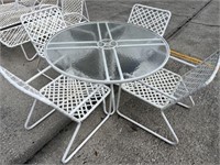 Brown Jordan woven patio table and 4 chairs.