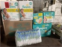 1 LOT 5 BOXES INCLUDING SIZE 1 AND 4 PAMPERS