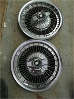 Vintage wire spinner hubcaps for a Buick.