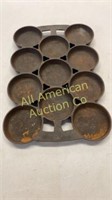 Antique cast iron No. 2  round 11 cup muffin pan