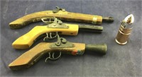 Three Old Pistol Reproductions And Bullet After
