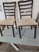 4 iron framed chairs with cloth seats some stains