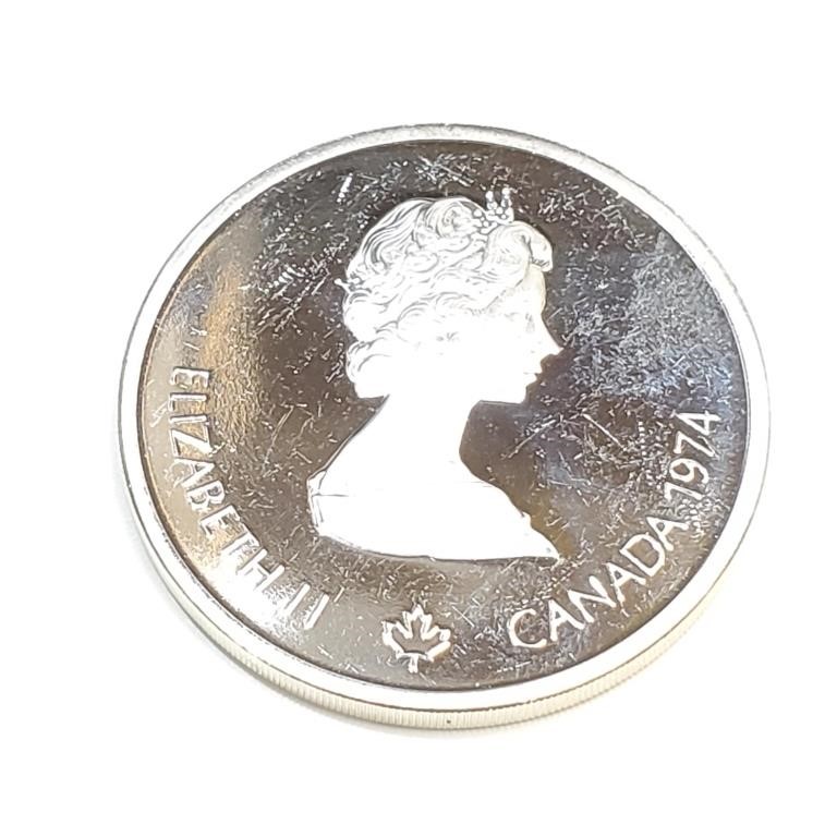 $450 Silver Montreal Olympic $10 Coin