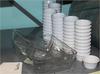 Shelf lot: 6 plastic hotels pans; 3 glass reamers