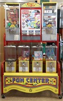 Coin Op Gumball / Toy Dispensing Machines on Rack