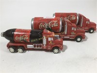 Lot: 3 plastic Coca Cola can/bottle trucks