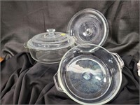 2 covered glass casserole bowls