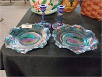 Pair of carnival glass candle holders and plates