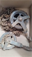 Two vintage pulleys