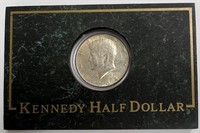 1964 Kennedy Half Dollar in Display Block