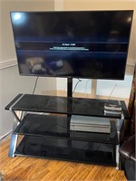 Television remote and tv stand all in one