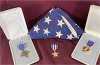 Military medals and flag